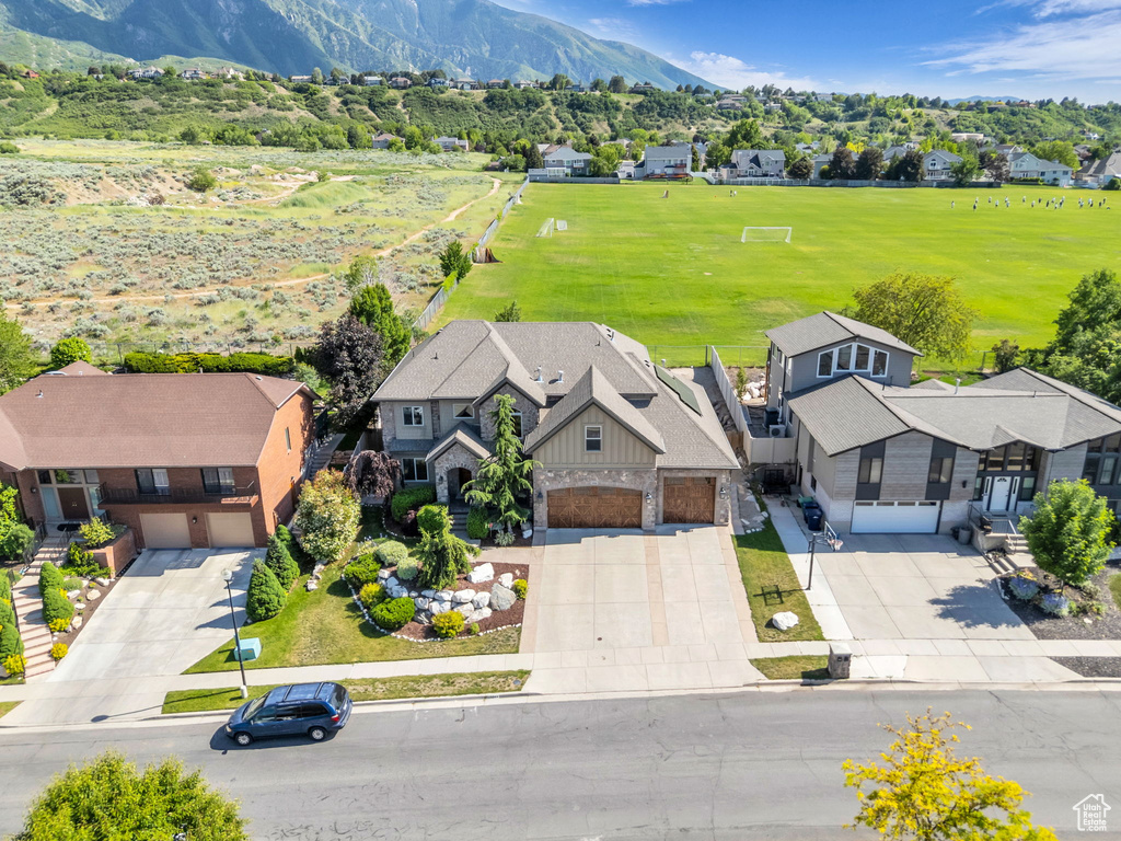 Aerial view of residential area with a mountainous background