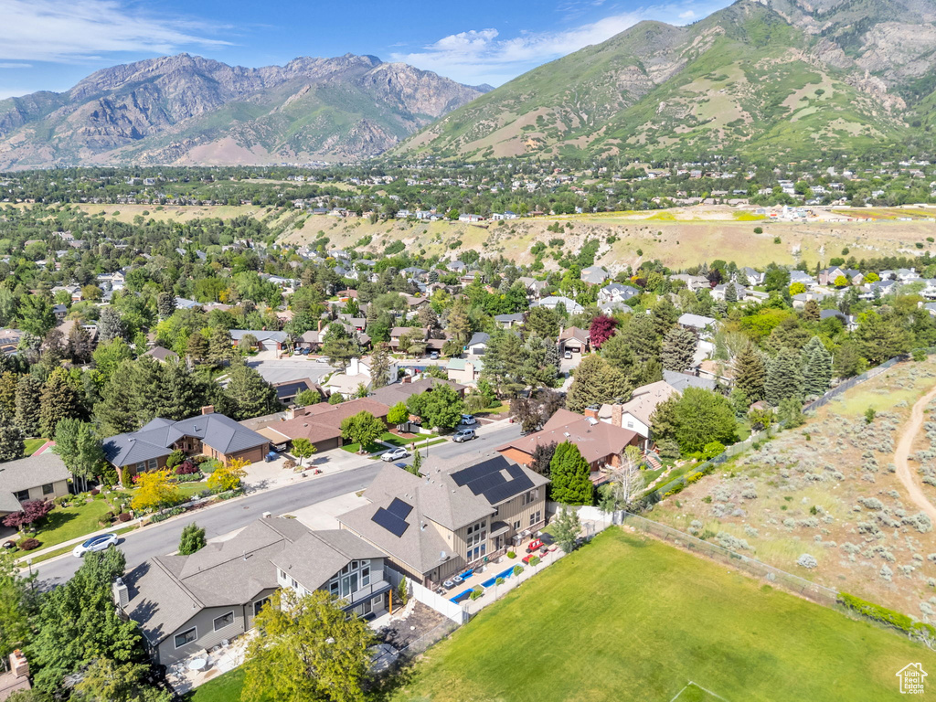 Aerial view of residential area with a mountain backdrop