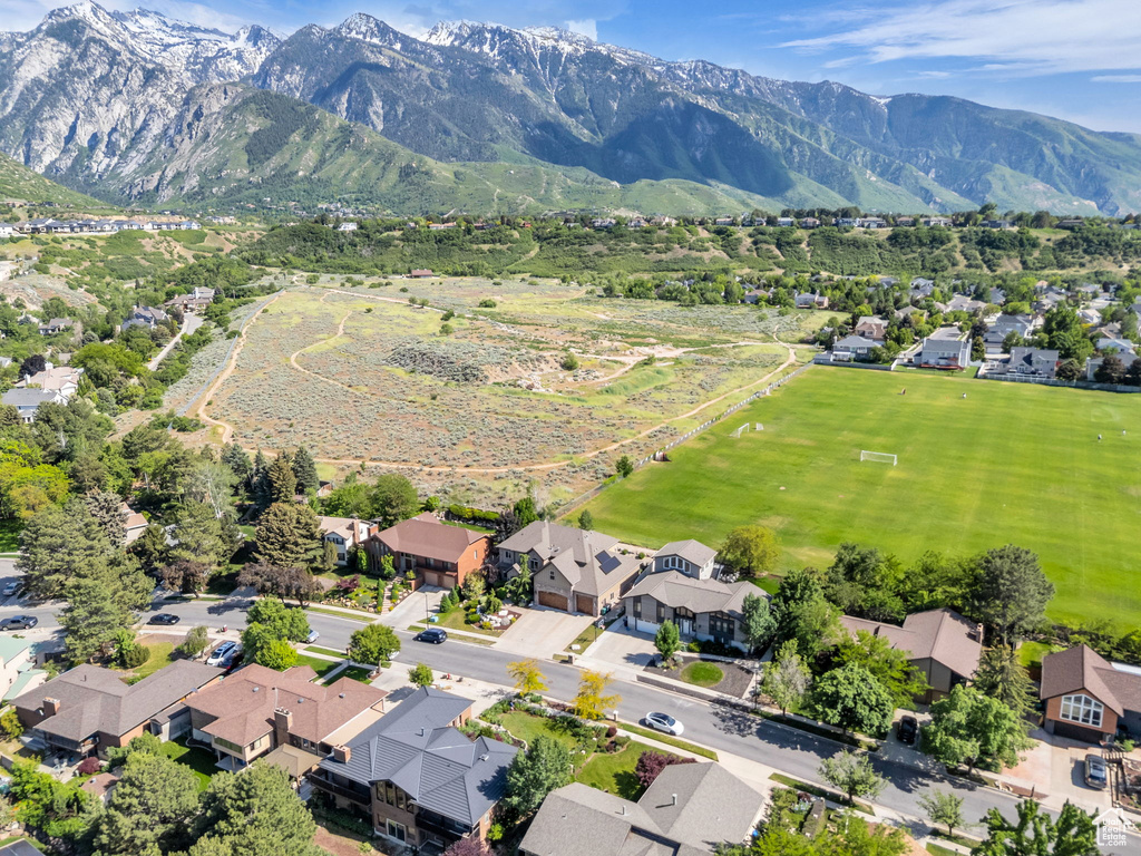 View of property location with nearby suburban area and mountains