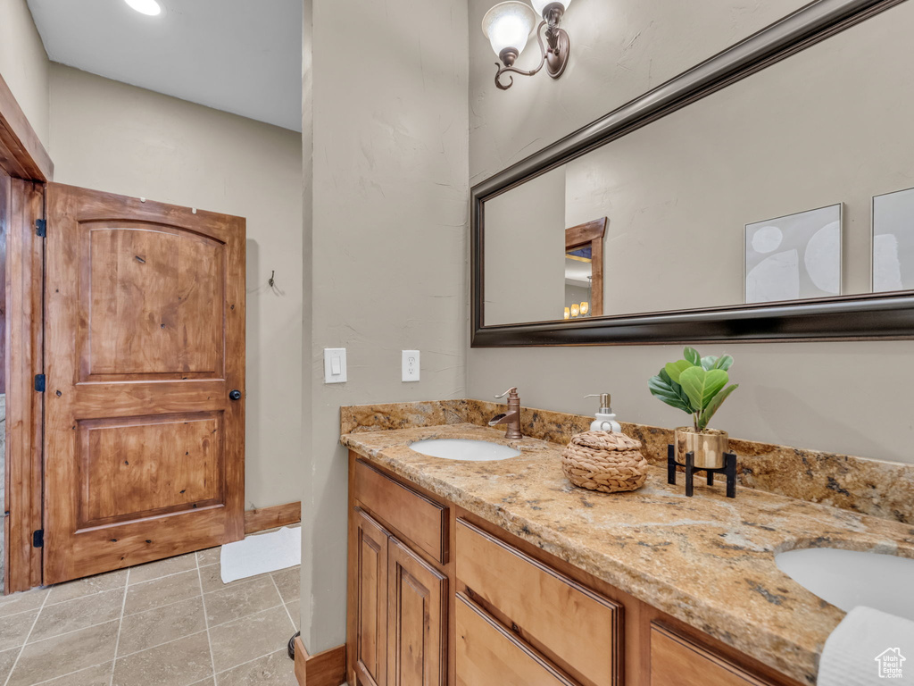 Full bath with double vanity and recessed lighting