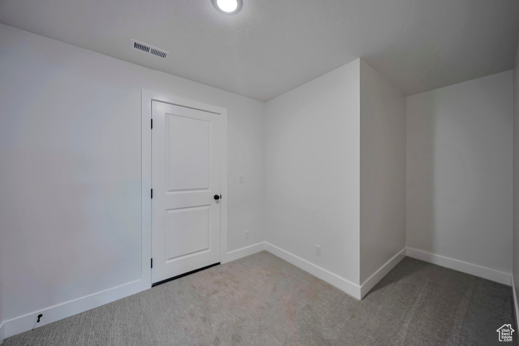 Bonus room featuring carpet and baseboards