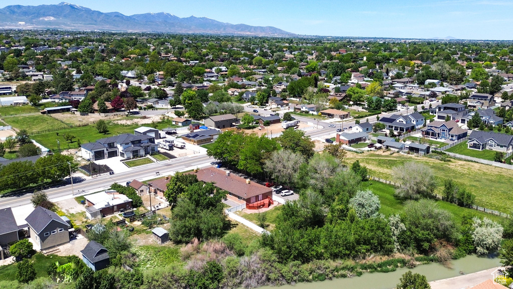 Aerial view of residential area with a mountainous background