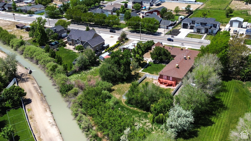 Aerial overview of property's location featuring nearby suburban area