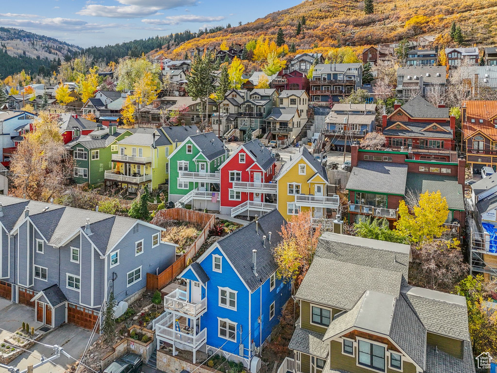 Aerial view of residential area with a mountain backdrop