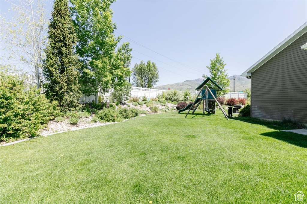 View of yard with a playground