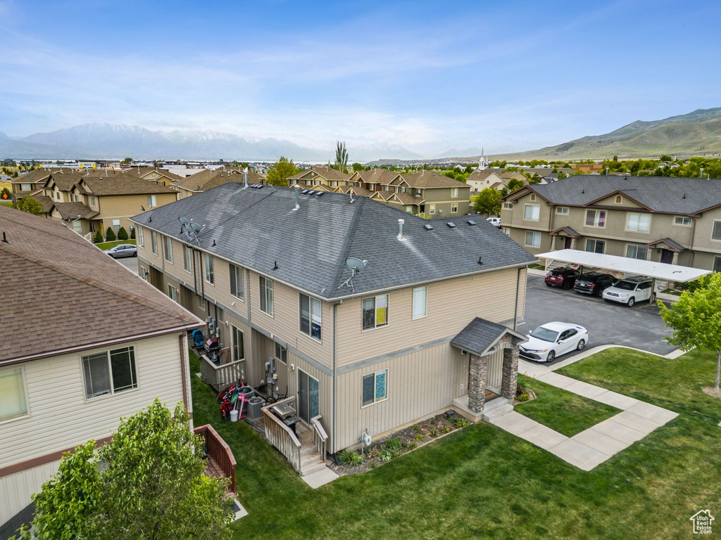 Aerial view of residential area with mountains