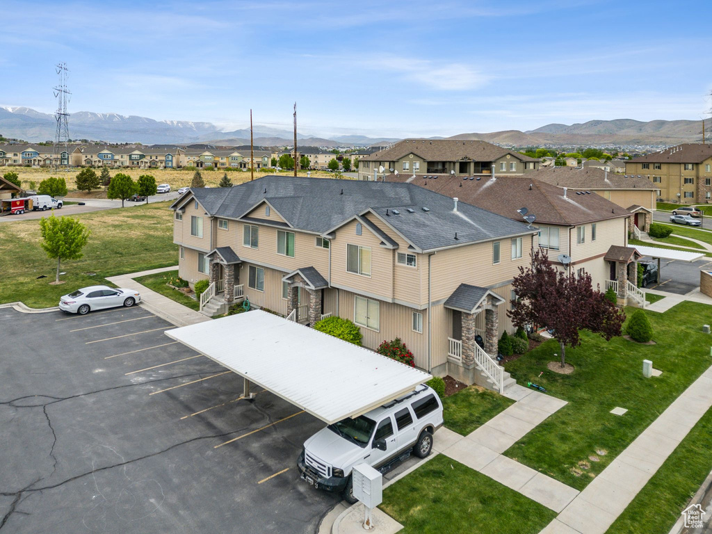 Aerial perspective of suburban area featuring mountains