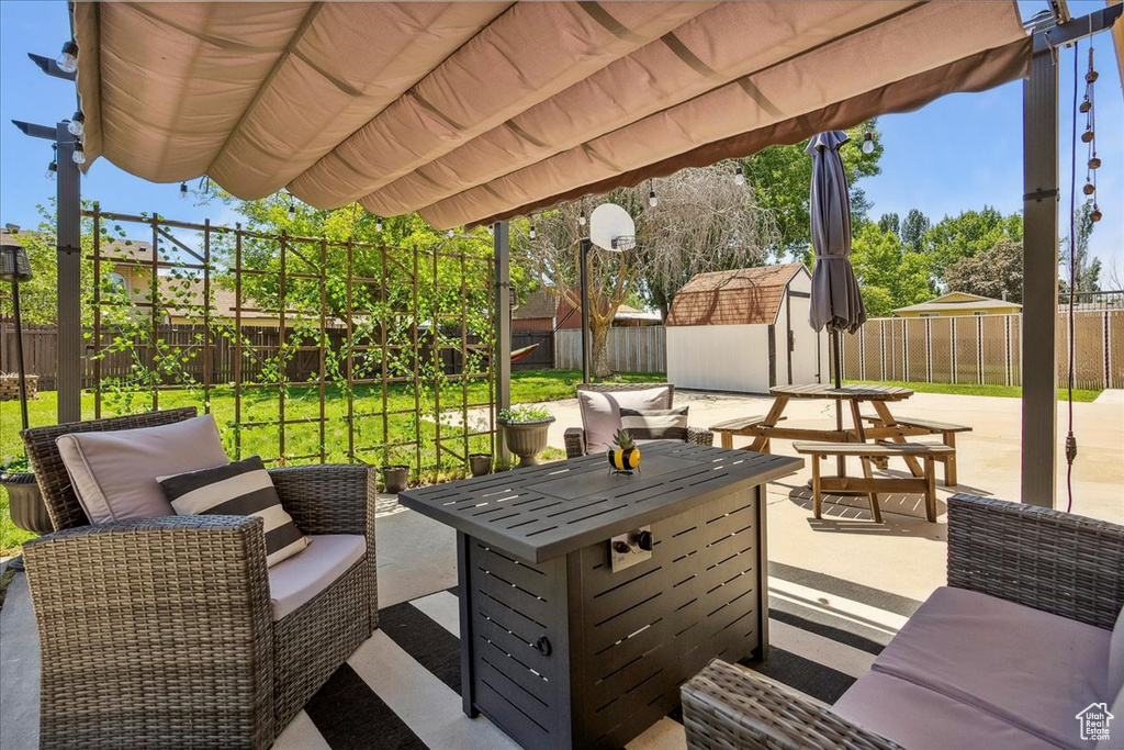 Wooden terrace with outdoor lounge area and a patio