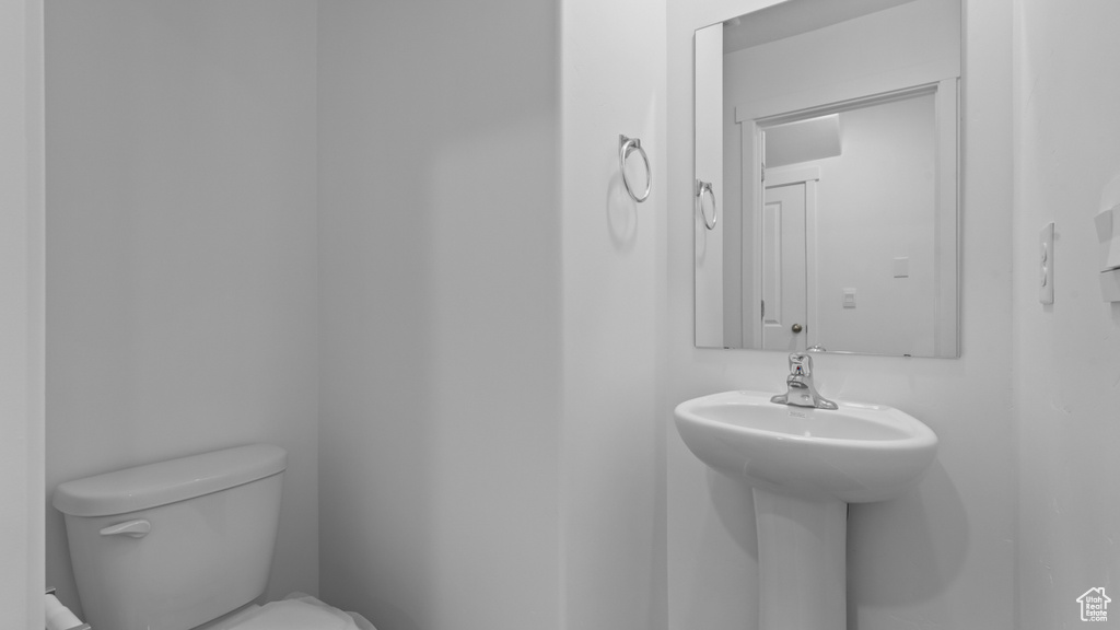 Bathroom with toilet and a sink