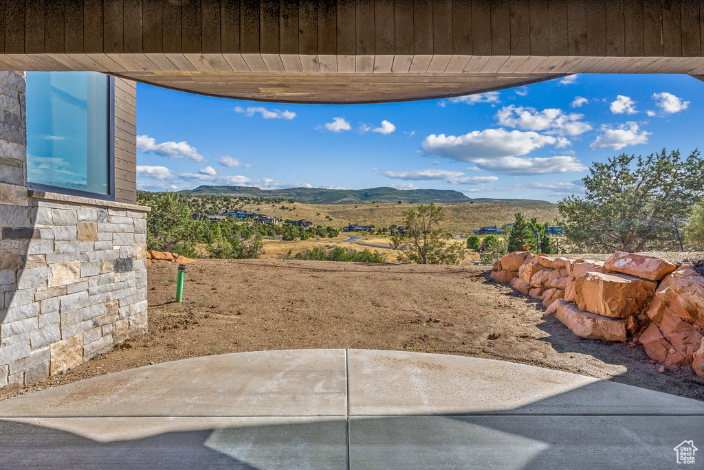 View of patio / terrace featuring a mountain view