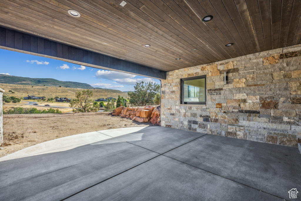 View of patio with a mountain view