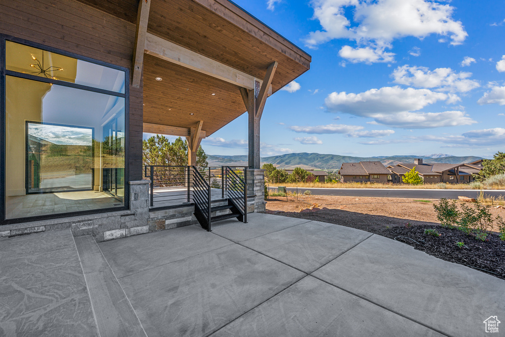 View of patio / terrace with a mountain view
