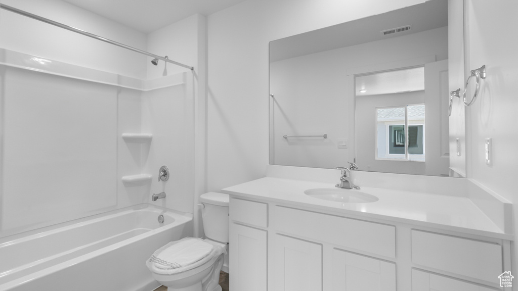 Full bath with toilet, bathing tub / shower combination, and vanity