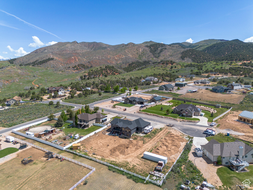 Aerial view of residential area with a mountain backdrop