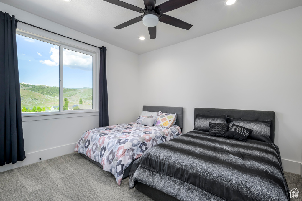 Carpeted bedroom with recessed lighting, baseboards, and ceiling fan