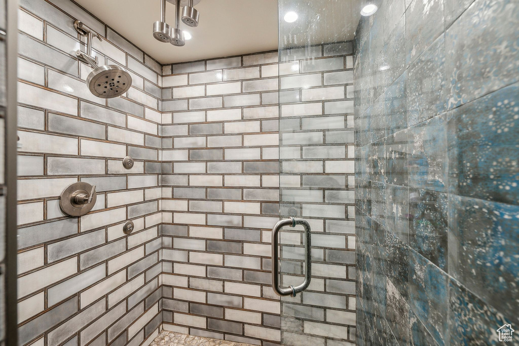 Full bathroom with a shower stall