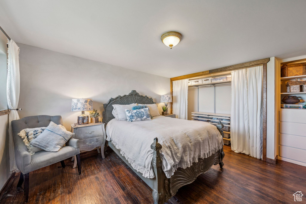 Bedroom with wood finished floors