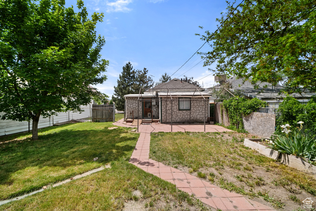 View of yard featuring a patio