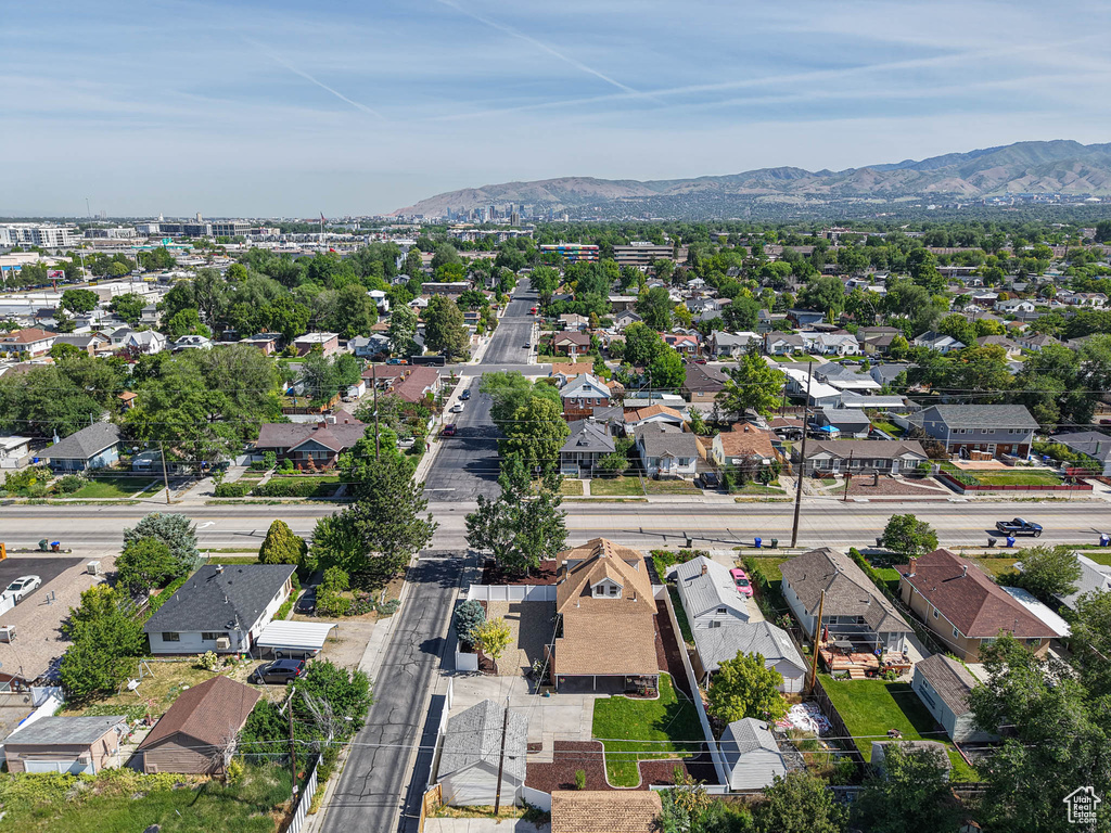 Aerial view of residential area featuring mountains
