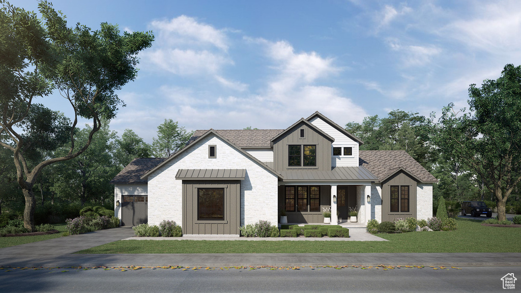 Modern farmhouse style home with a standing seam roof, board and batten siding, metal roof, and a porch