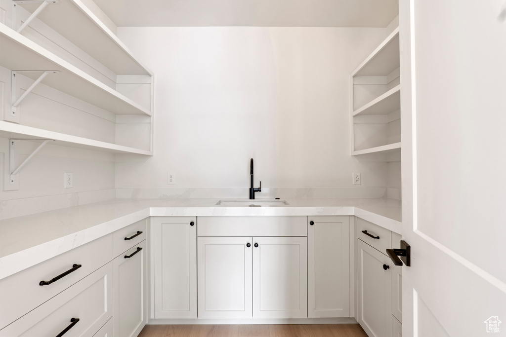 Storage area featuring a sink