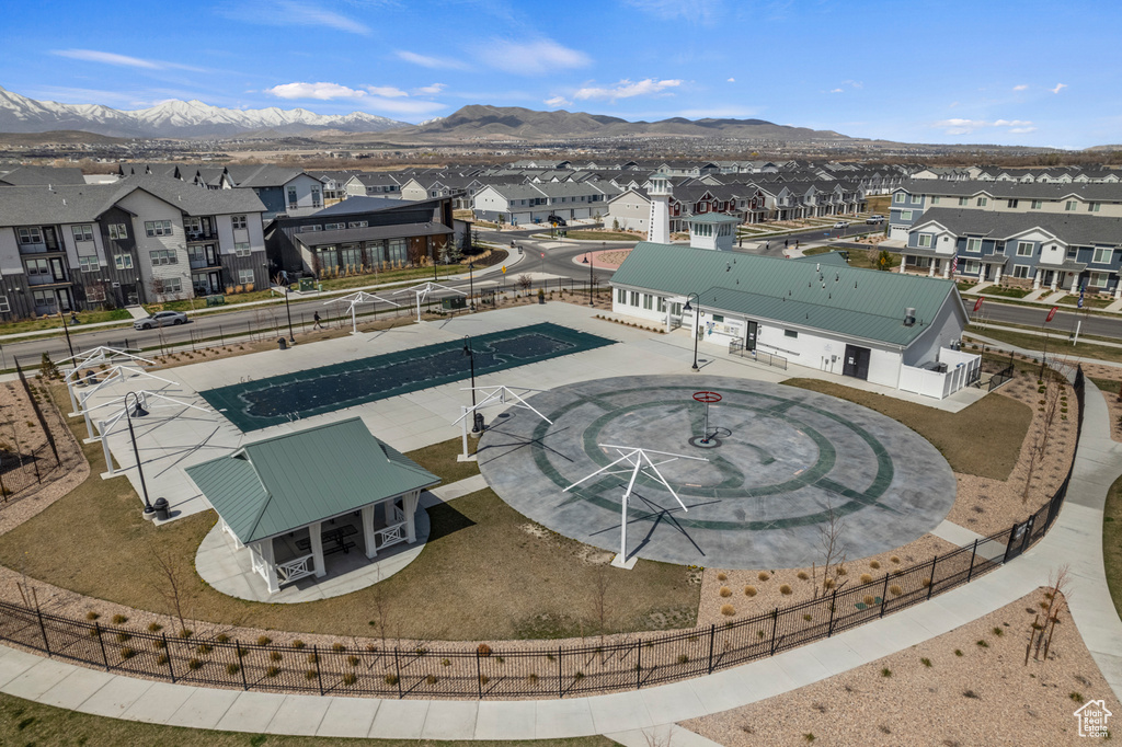 Aerial view of residential area featuring mountains