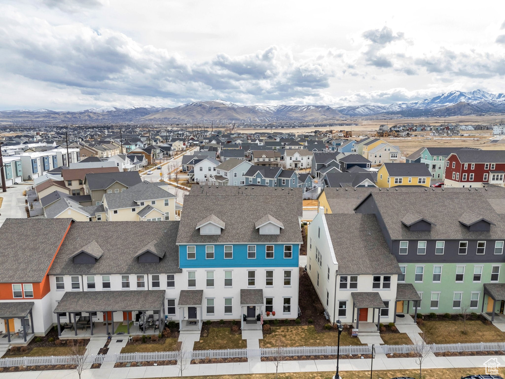 Aerial view of residential area with a mountain backdrop