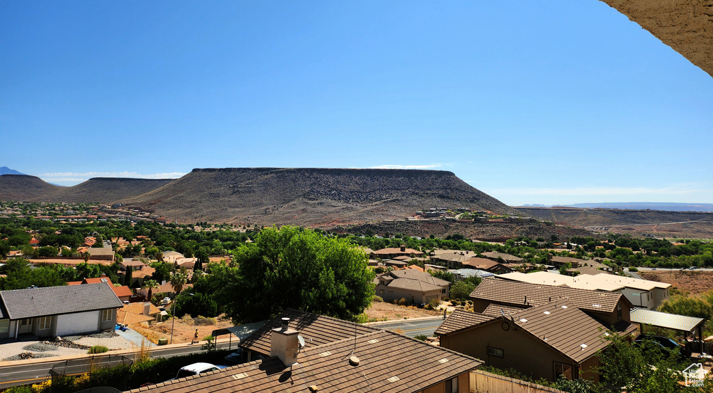 Mountain view featuring nearby suburban area