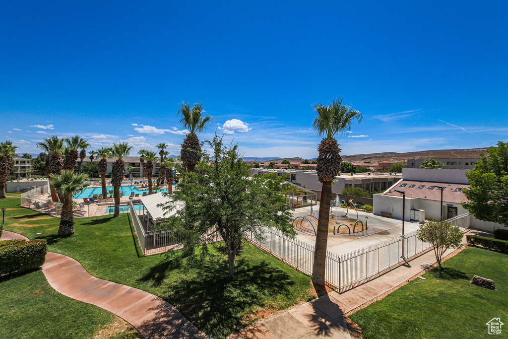 View of yard with a community pool