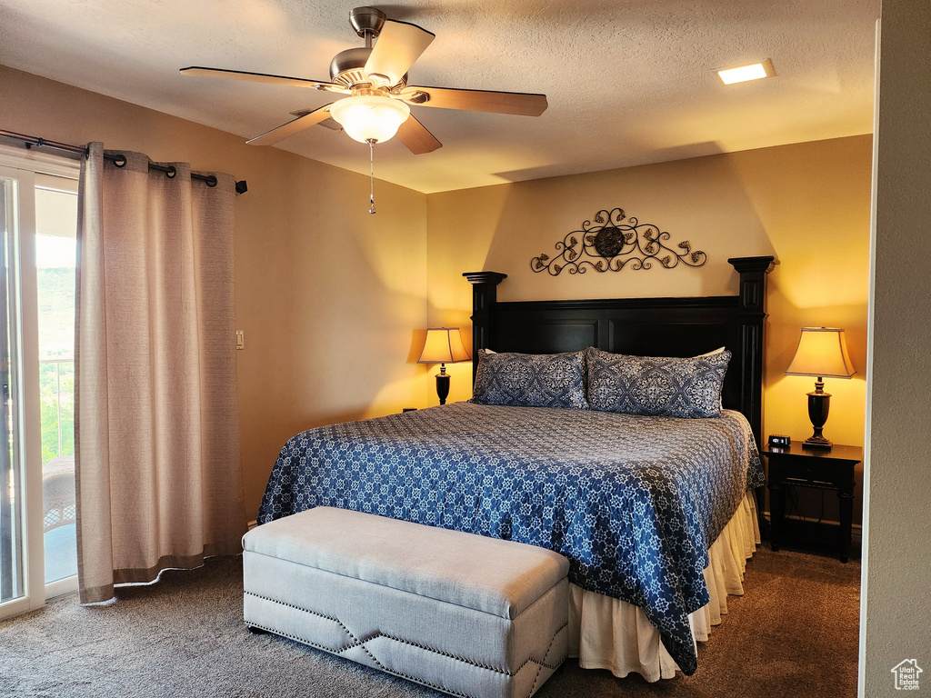Bedroom with carpet flooring and a ceiling fan