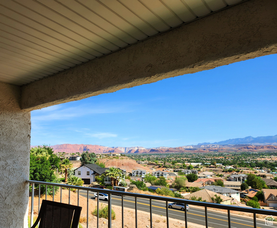 Balcony with a mountain view and a residential view