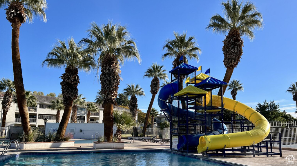 Community pool with a water slide