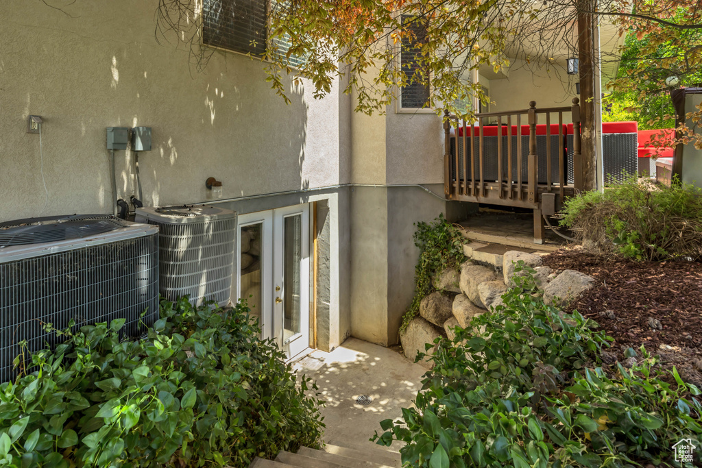 View of patio / terrace featuring central AC unit and french doors
