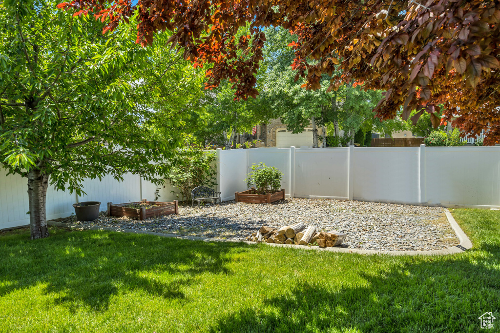 View of yard with a vegetable garden