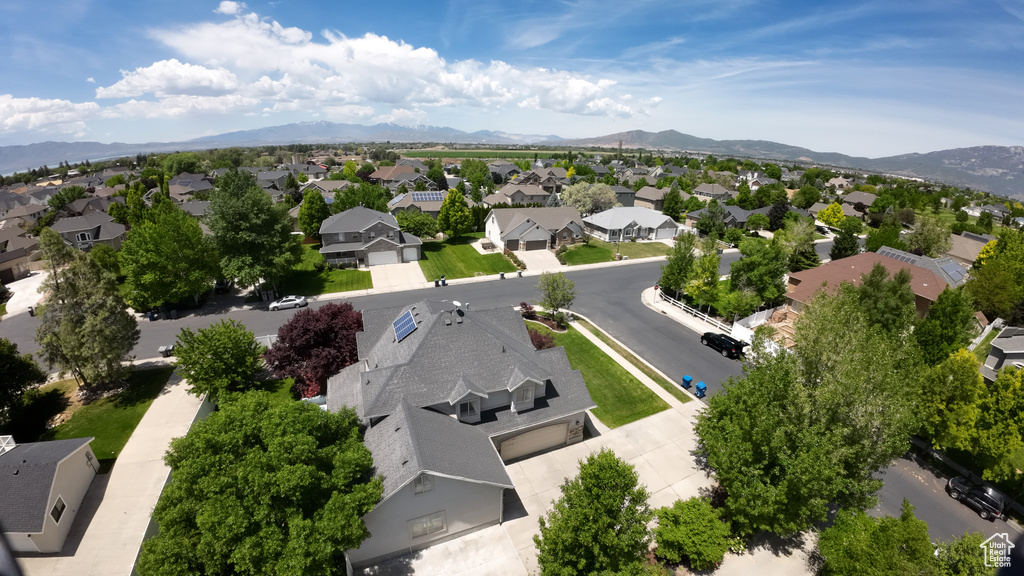 Aerial view of residential area with mountains