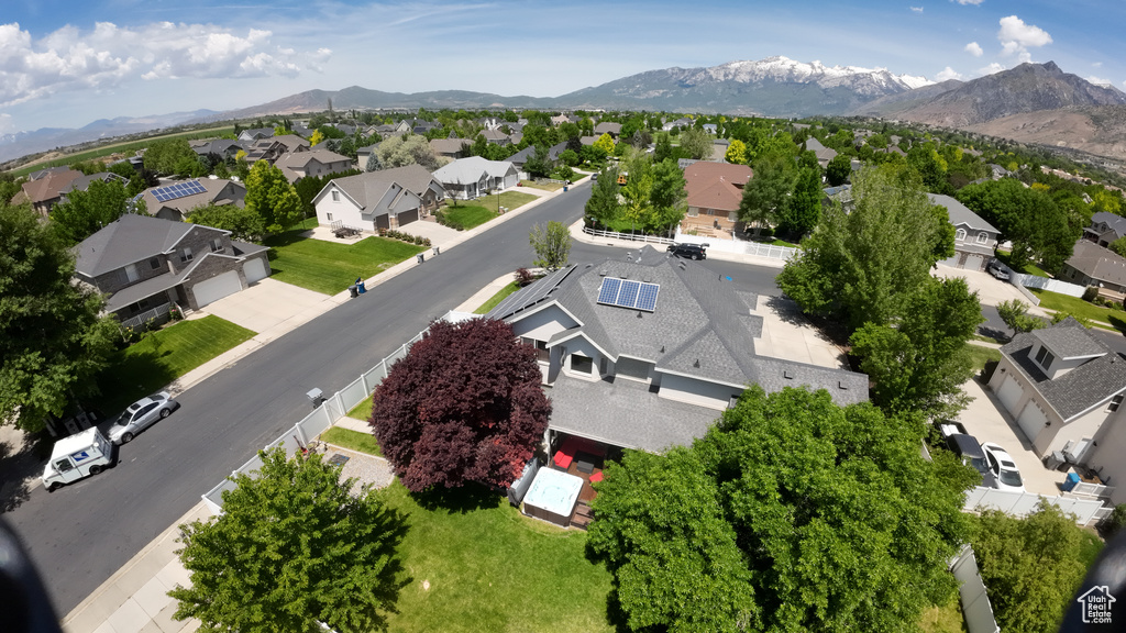 Aerial view of residential area featuring mountains
