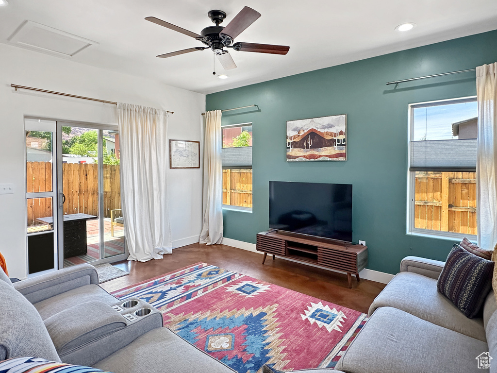 Living room with attic access, recessed lighting, baseboards, and ceiling fan