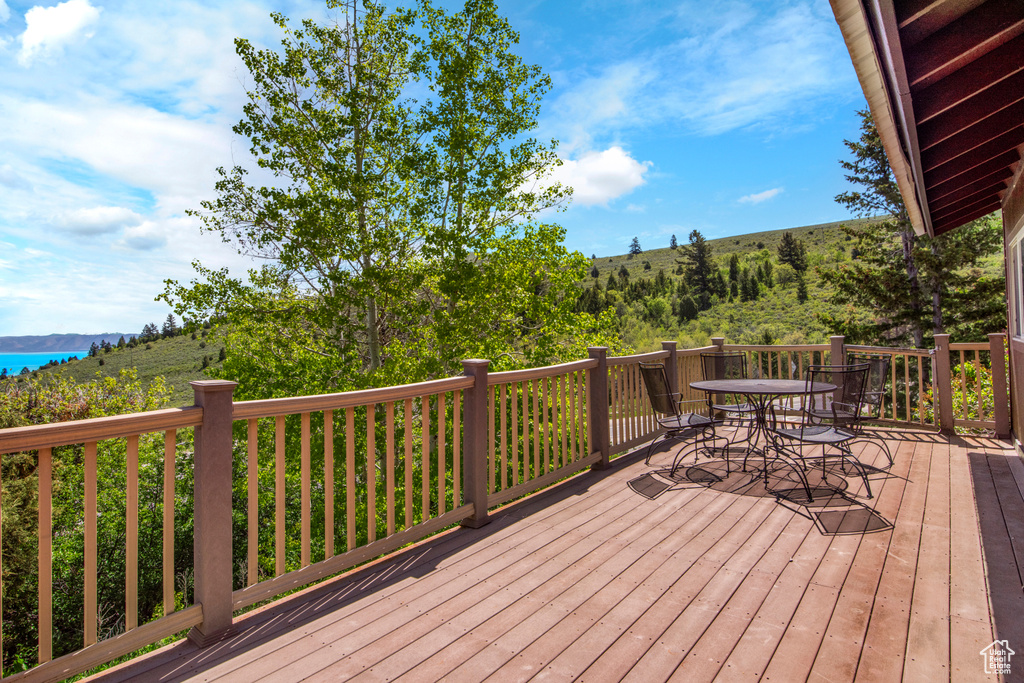 Wooden terrace with outdoor dining space