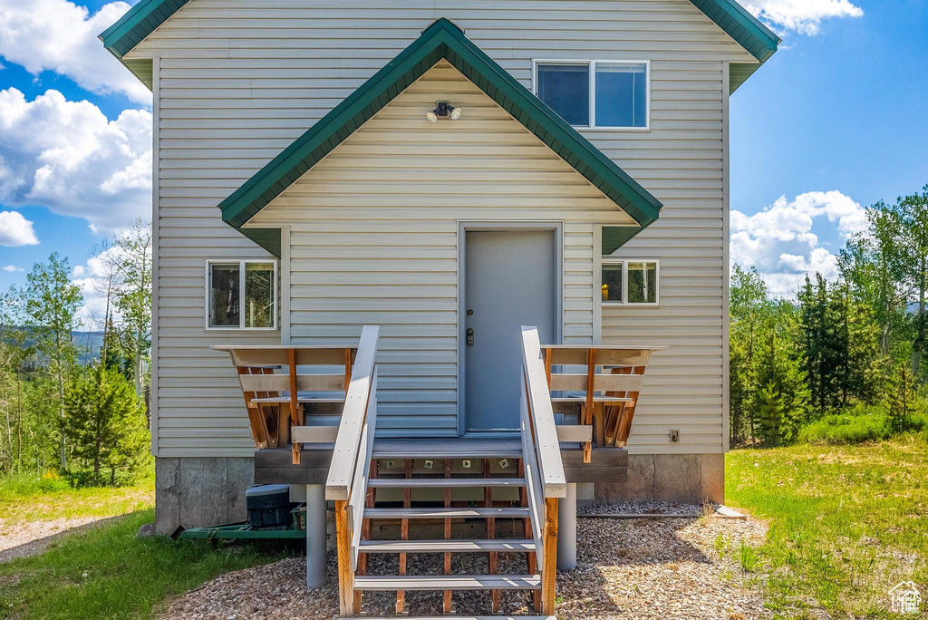 Rear view of property with a deck