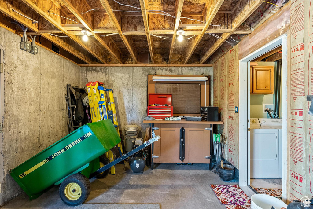 Below grade area with washer and dryer