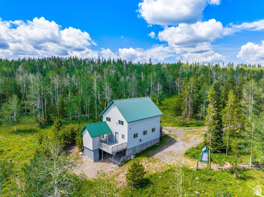 View from above of property featuring a forest