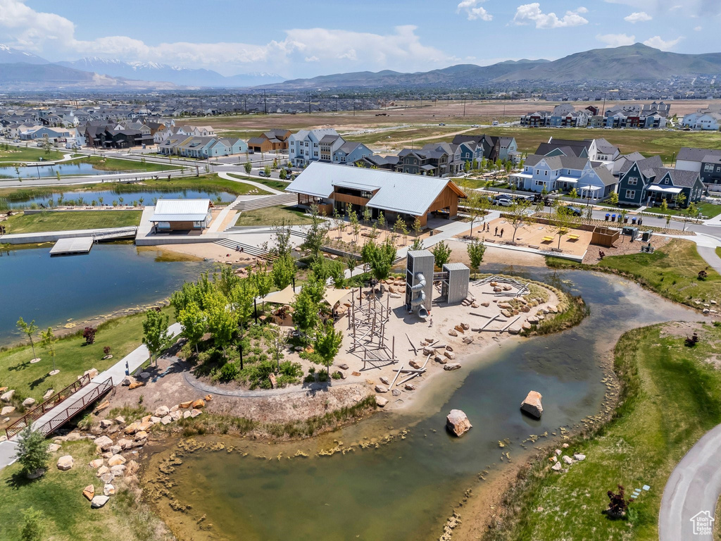Aerial view of residential area with a mountainous background