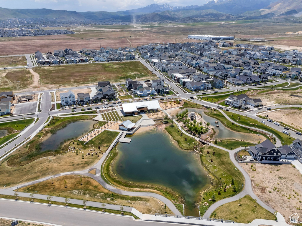 View of property location with nearby suburban area and a water and mountain view