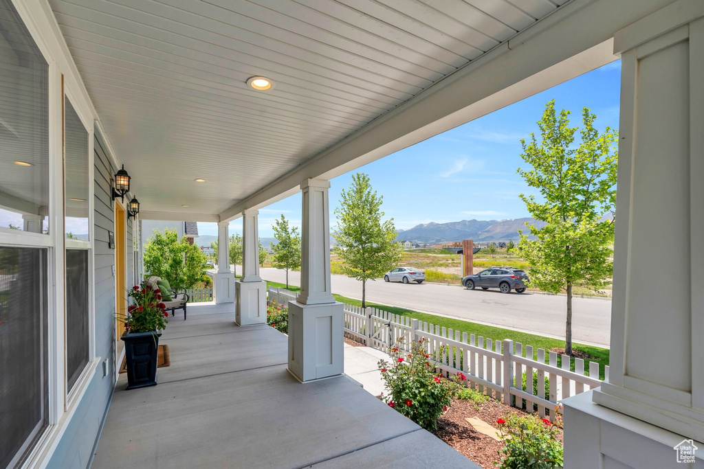 Porch featuring a mountain view