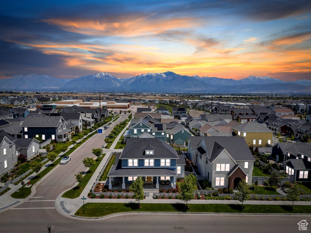 Aerial view at dusk of a residential view and a mountain view