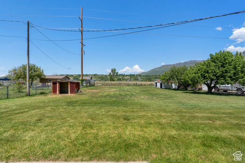 View of yard with a mountain view