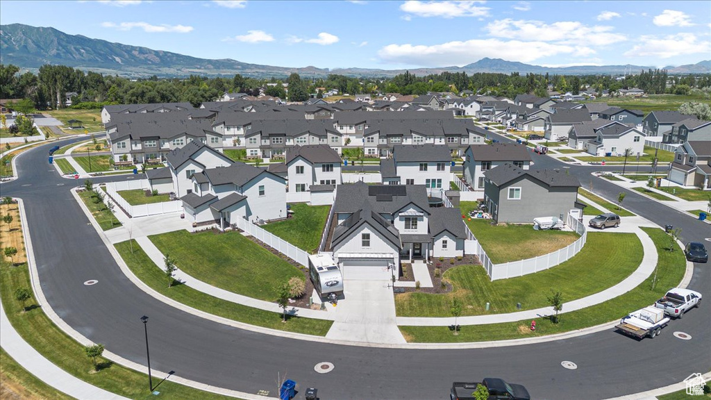 Aerial view of residential area with a mountain backdrop