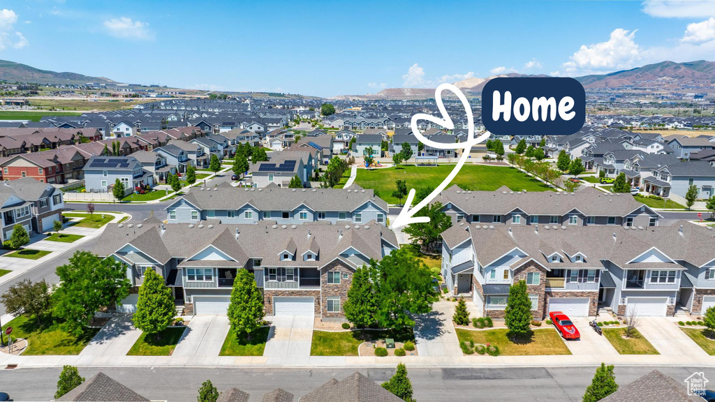 Aerial view of residential area with mountains