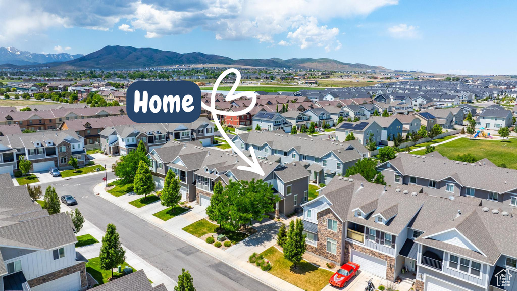Aerial view of residential area with mountains