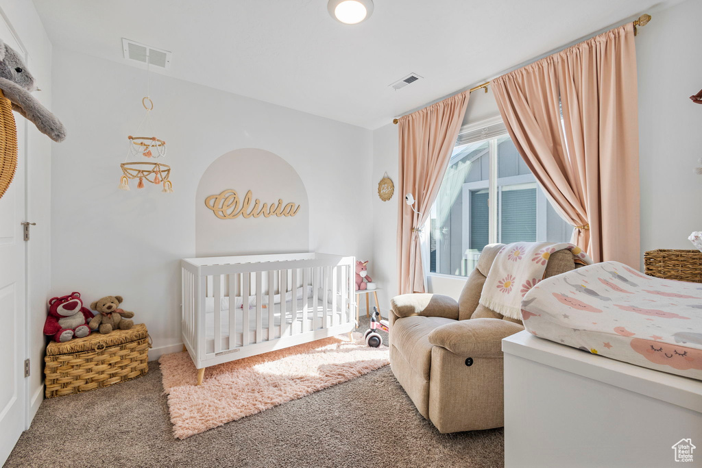 Bedroom featuring carpet floors